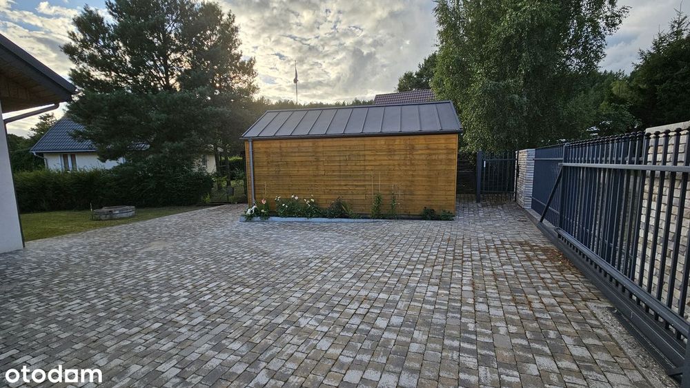 sprzedam komfortowy dom z pięknym widokiem na jezioro