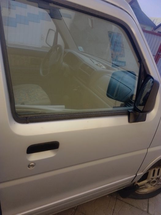 Двері автомобільні Сузукі вагон