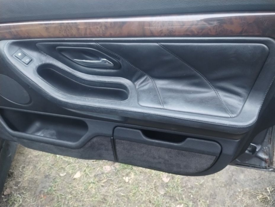BMW e38 boczki drzwi skóra szyte rączki komplet