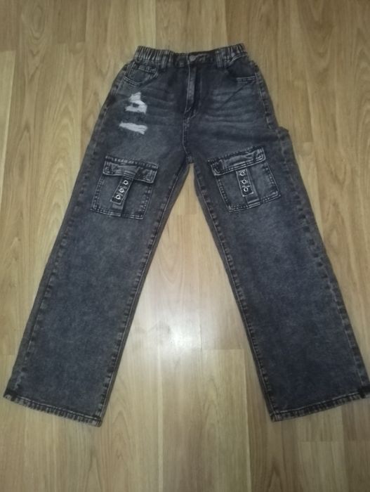 Широкі джинси на хлопчика 11-12 р