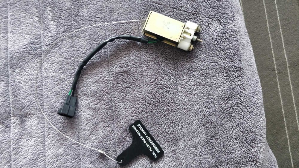 Motor da tampa combustível kia carnival