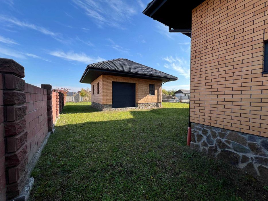 Продаж готового будинку з ділянкою та гаражем !