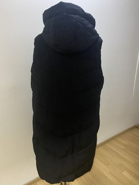 Жіноча жилетка