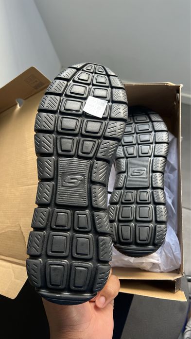 Sapatilha preta de Skechers