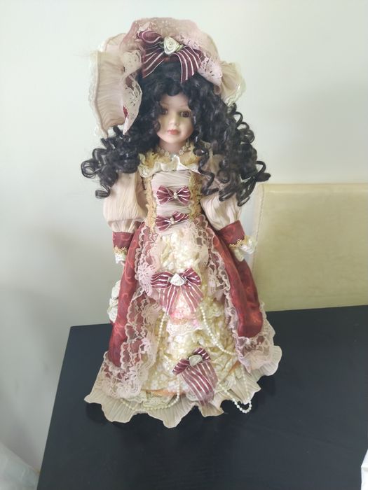 Conjunto de 9 bonecas de porcelana