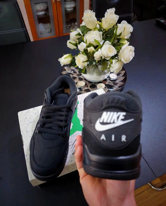 Jordan 4 RM Black Cat