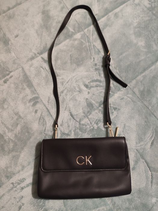 Bolsa/clutch tira colo