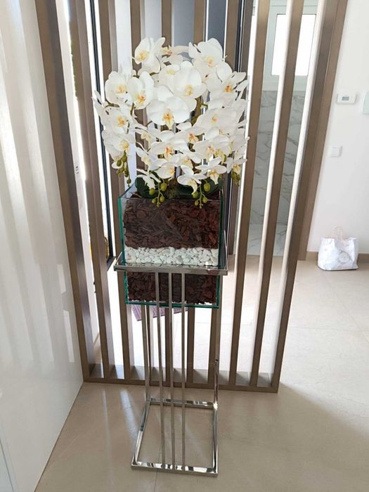 Floreiras em inox polido brilhante