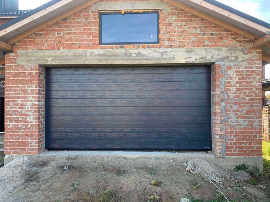 Гаражні ворота секційні / ролетні під ваш запит