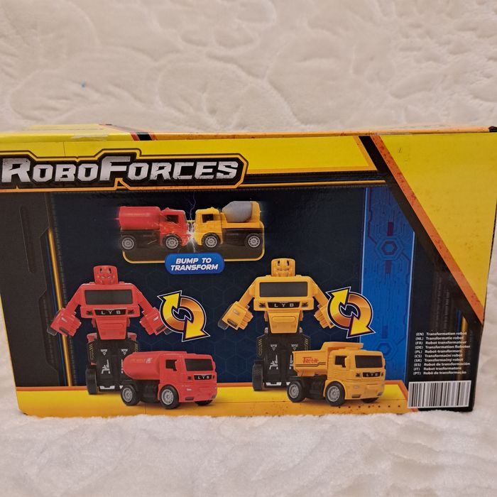 Dwa pojazdy budowlane transformujące