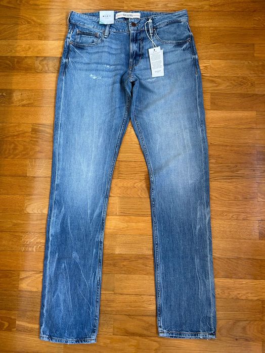 Calças GUESS novas com etiqueta e preço de origem
