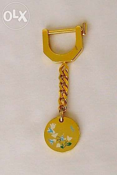 Porta Chaves dourado com flores