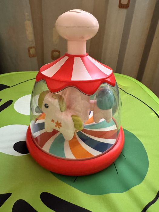 Дзига іграшка коники на каруселі