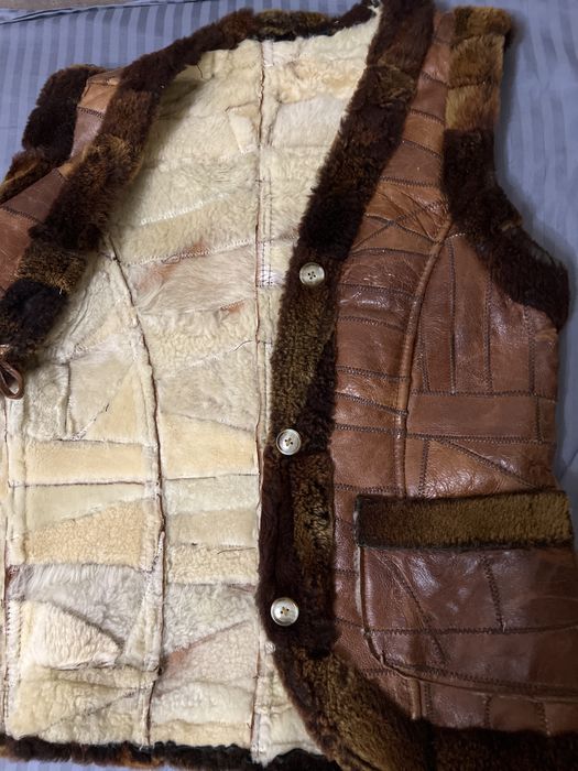 Жіноча шкіряна жилетка