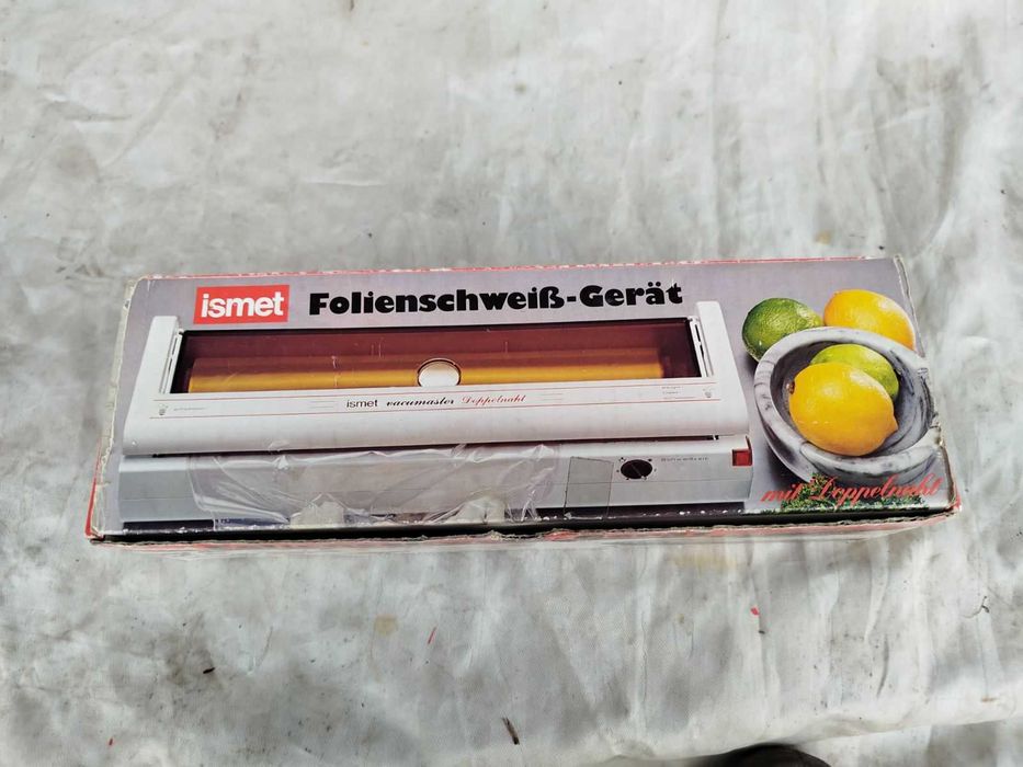 Упаковочная машинка  в полиэтилен.