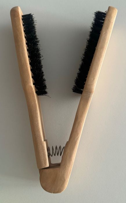 Escova de alisar o cabelo