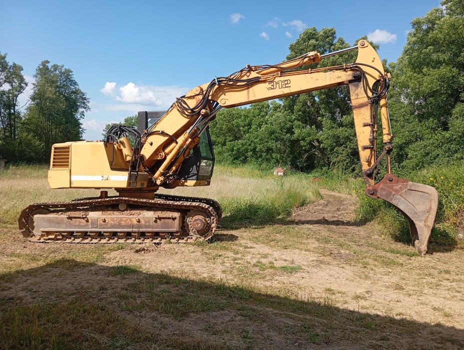 Giratória Liebherr r312 Guarda • OLX.pt