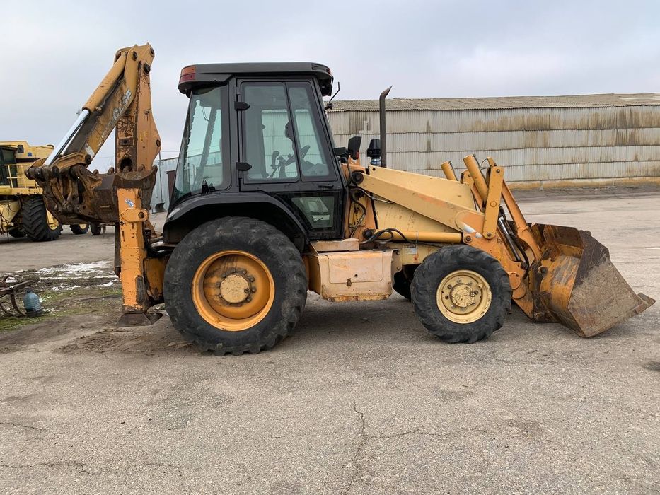 Case 580SM екскаватор навантажувач