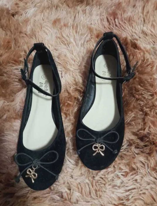 Дитячі туфельки.