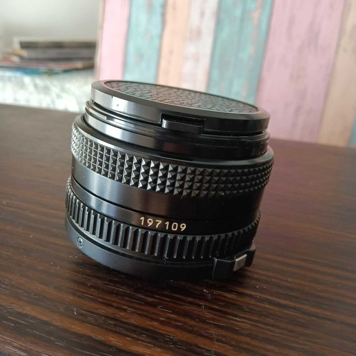 Câmara Analógica Canon T50 + Teleobjetiva OPTRON – Vintage & Clássica!