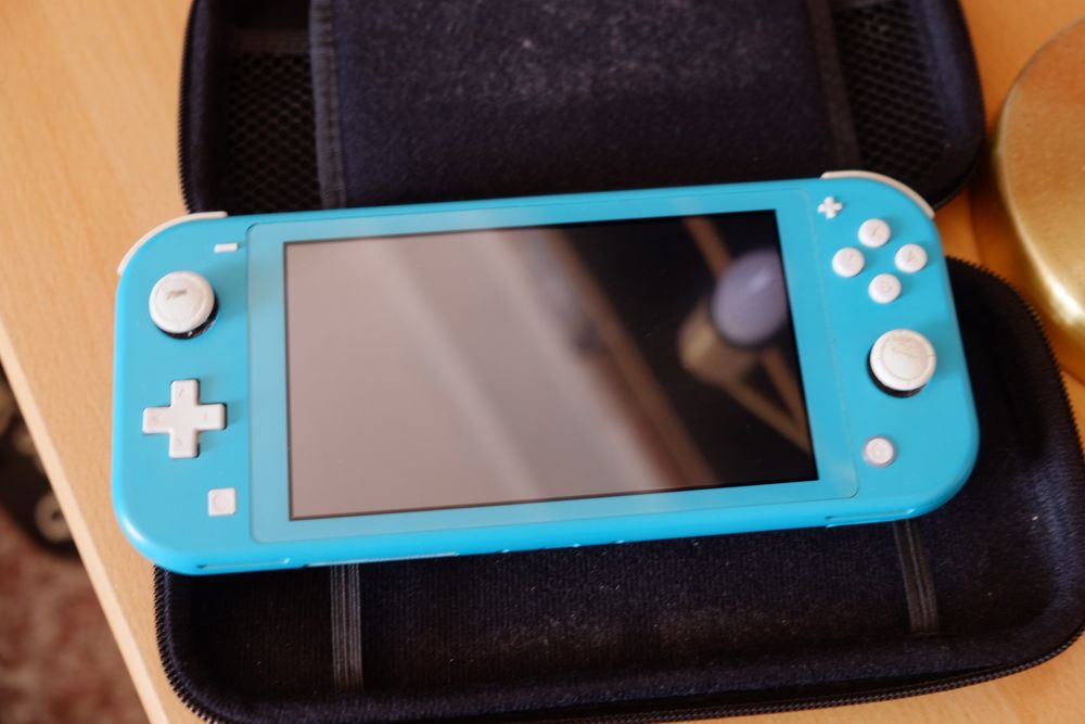 Nintendo Switch e carregador