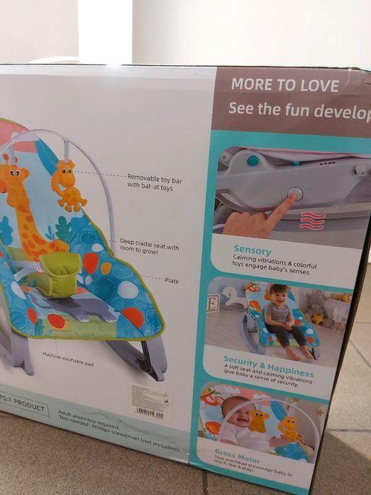 Шезлонг вібрація з мелодіями