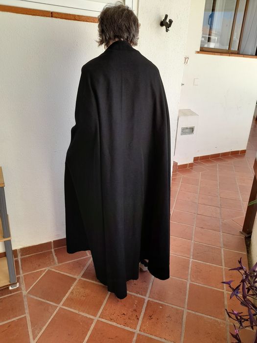 Traje académico para senhora.