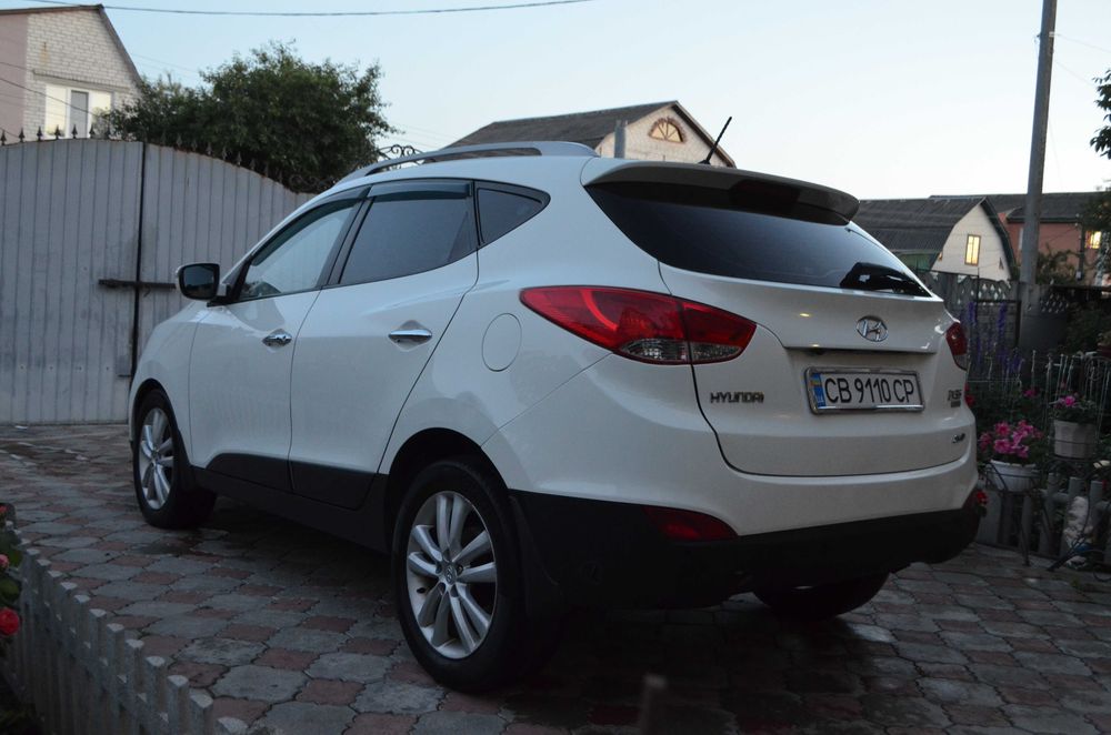 Hyundai ix35 2010 VIN KMHJU81CDBU167650 фото оголошення 5 з 24