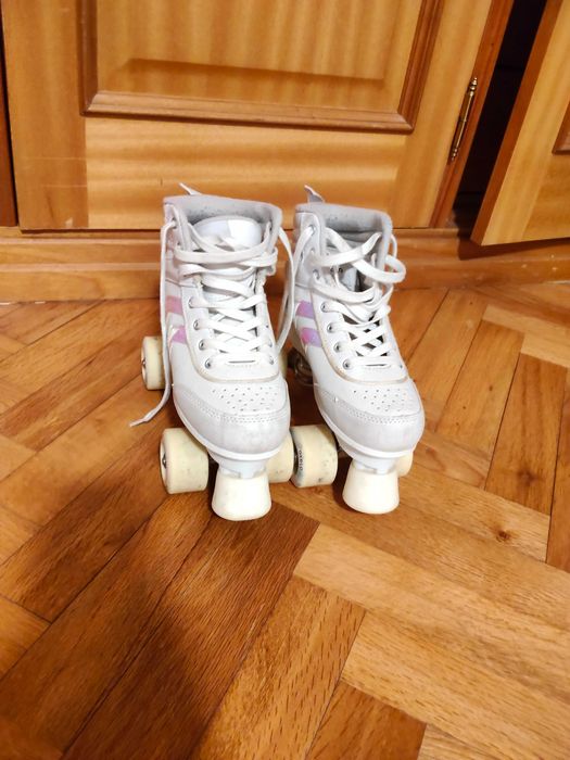 Patins quatro rodas, oxelo