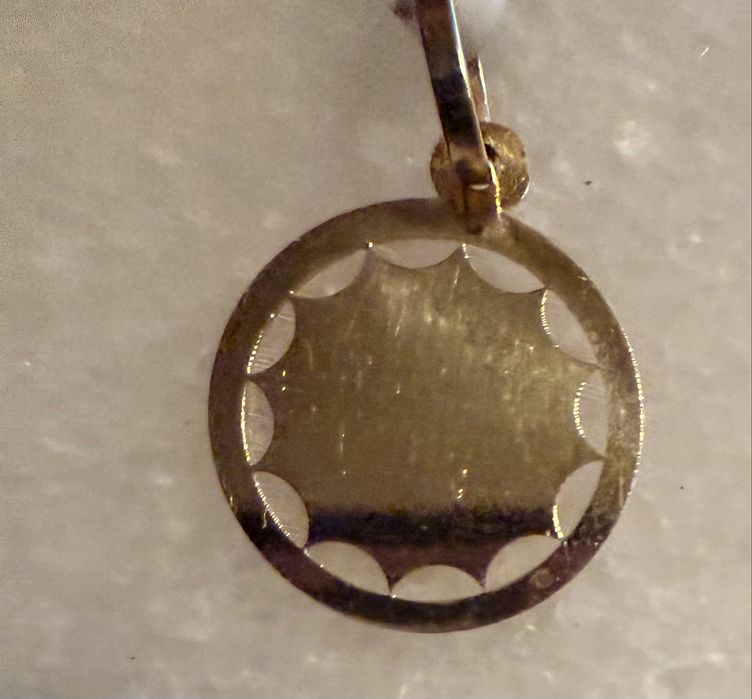 Medalha em ouro para fio