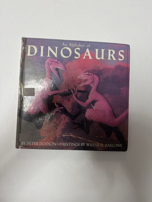 Книга про динозавров