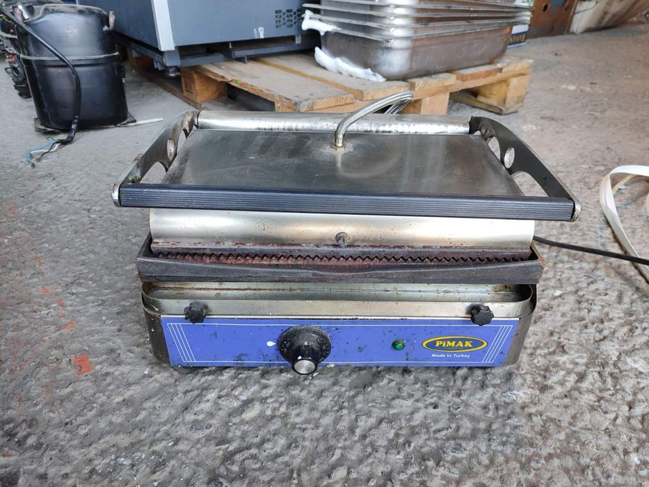 Гриль прижимной контактный. Жарочная поверхность