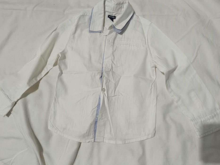 Camisa quase Nova, 4 anos