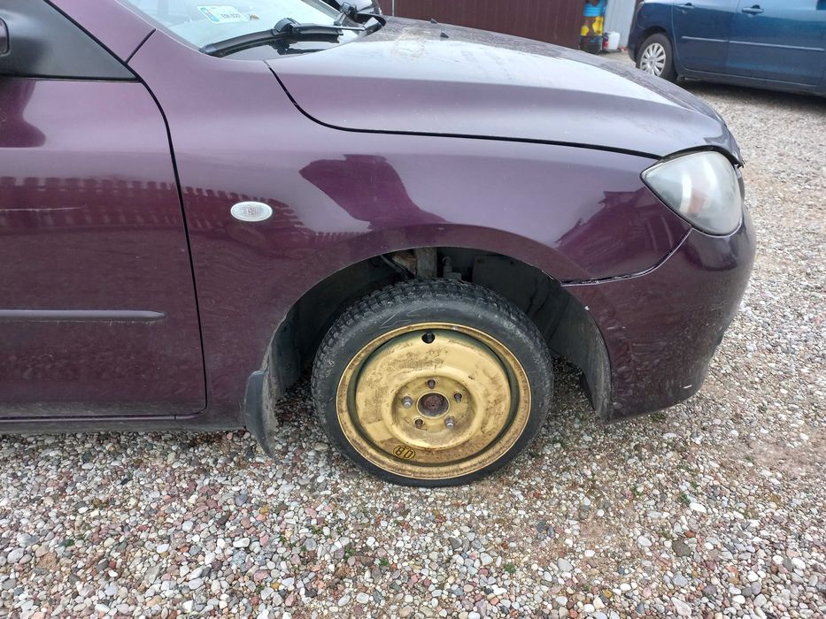 Klapa zderzak blotnik lampy pas mazda 3