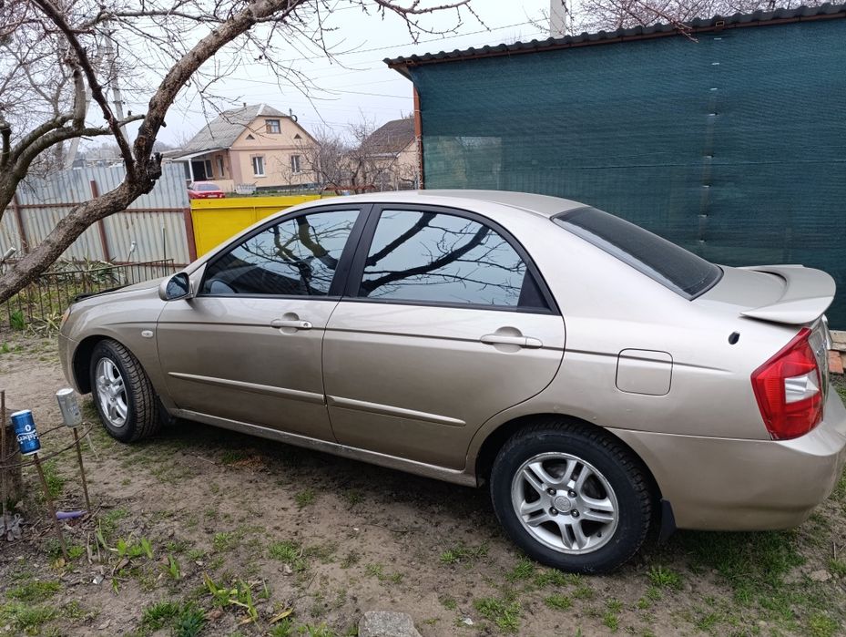 KIA Cerato 2.0 газ-бензин на кліматі