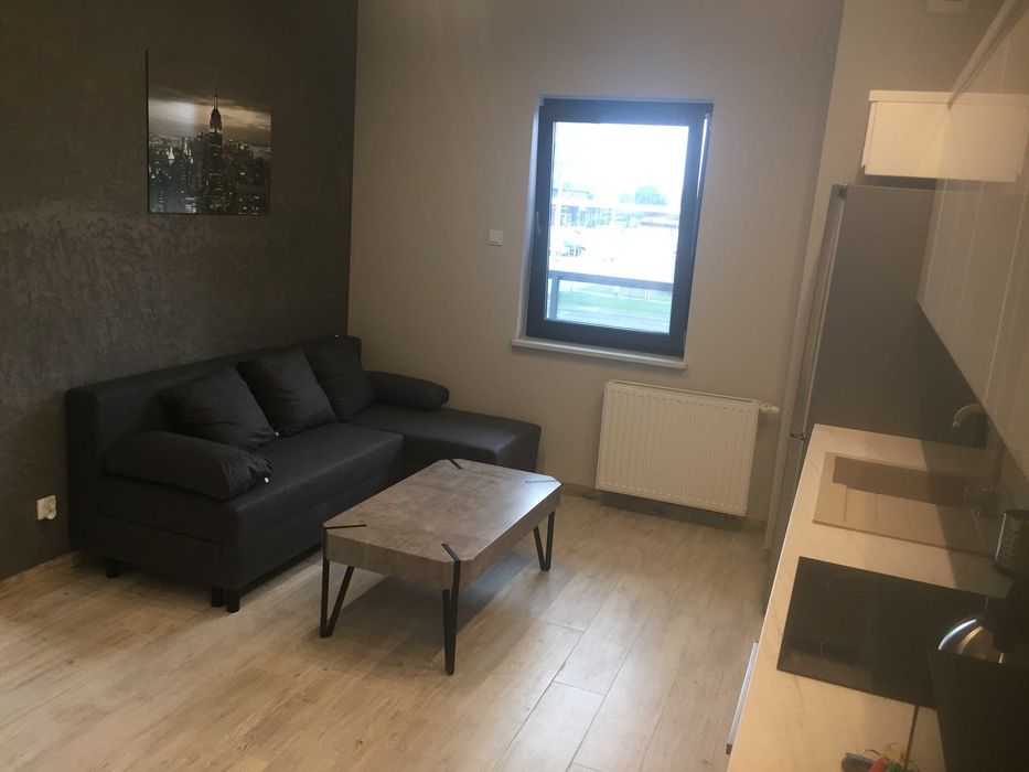 Pokój w apartamentowcu przy UMK