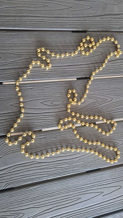 Colar de bijuteria, pérolas douradas