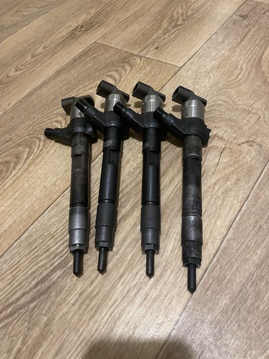 Форсунка Denso MITSUBISHI OUTLANDER 2.2  1465A353