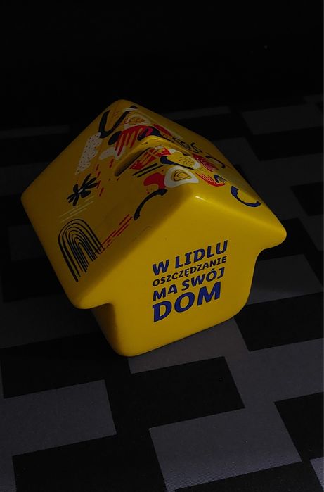 Żółta ceramiczna Skarbonka Lidl "W Lidlu oszczędzanie ma swój dom"