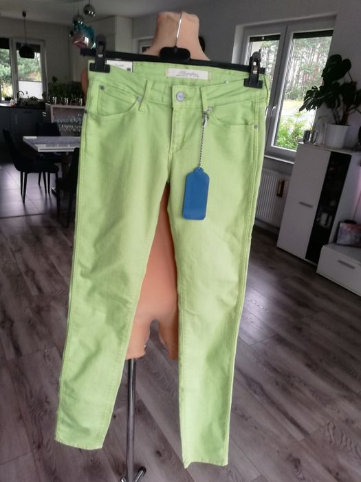 W25 L32 limonkowe nowe spodnie damskie jeansy rurki Wrangler