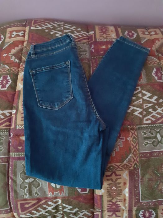 Темно сині скінні джинси