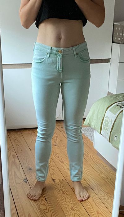 Miętowe spodnie r. 36