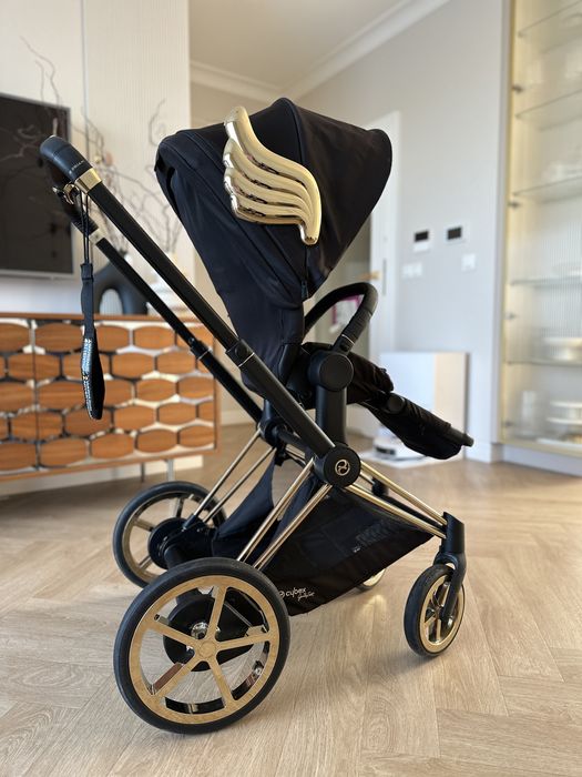 Cybex E-priam Jeremy Scott elektryczny stan bardzo dobry złote skrzydła