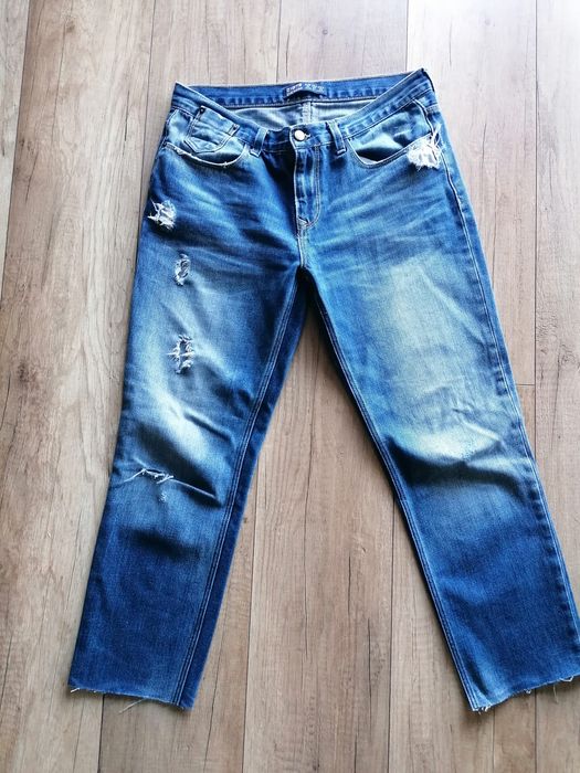 Jeansy z przetarciami Zara