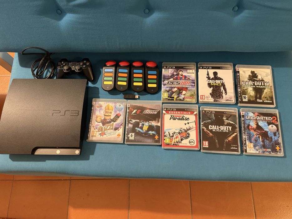 Playstation 3  + comando + jogos