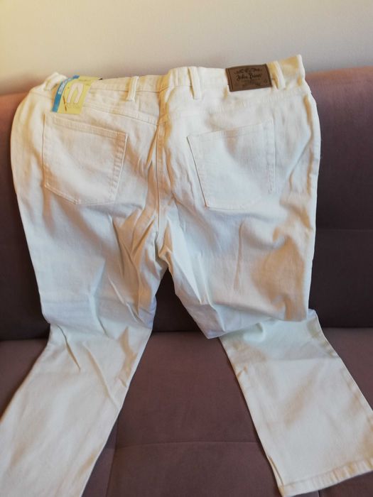 jeansy roz . 52 białe