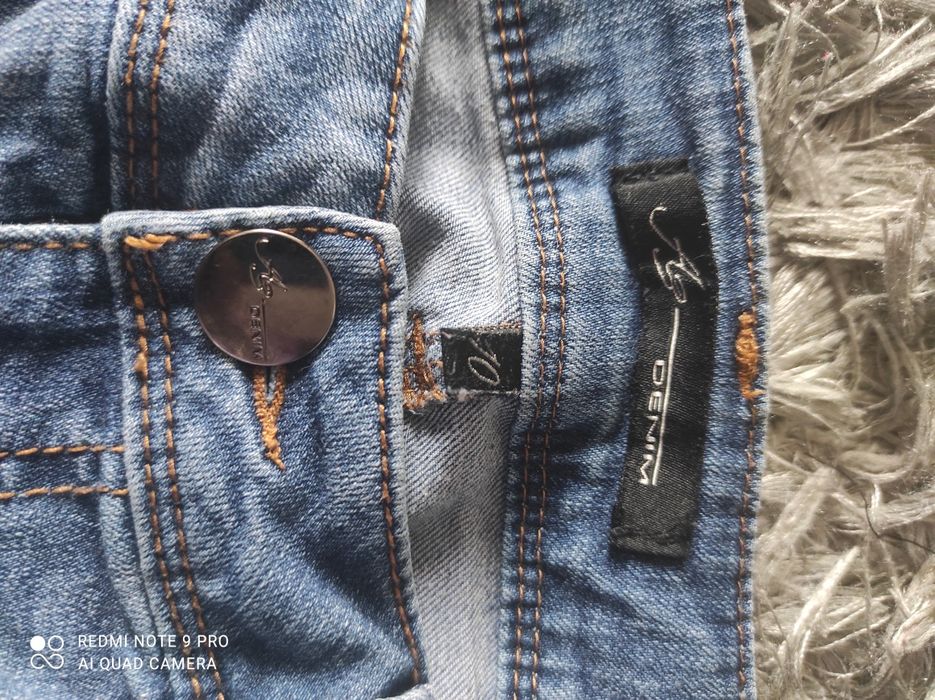 Spodnie dżinsowe " porwane"