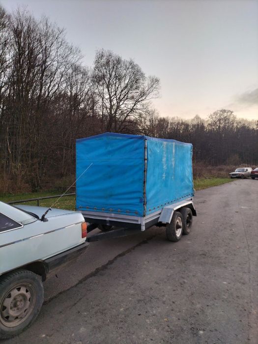 До вашої уваги бортовий 2-х осний причеп