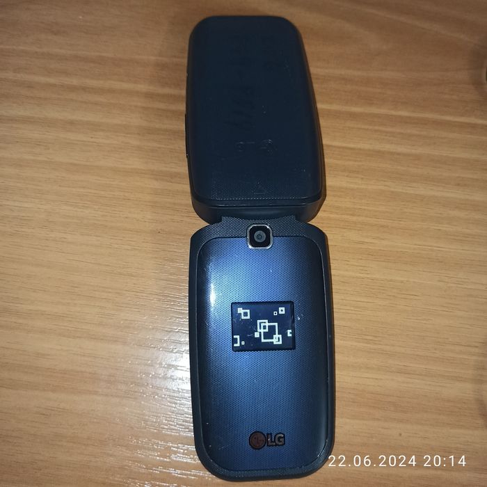 Мобільний телефон - разкладушка LG 450