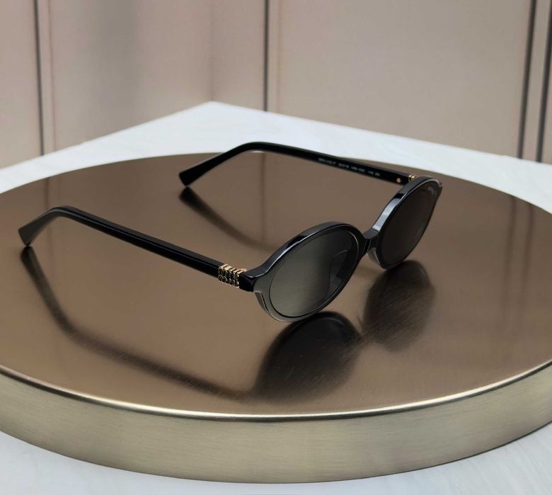Сонцезахисні окуляри Miu Miu SMU 04Z - F чорні овальні вузькі ацетатні, сіра лінза, жіночі, оригінал